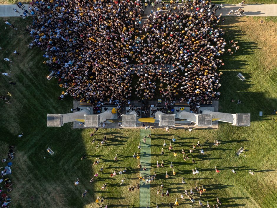 Large group of students gathered at the Columns