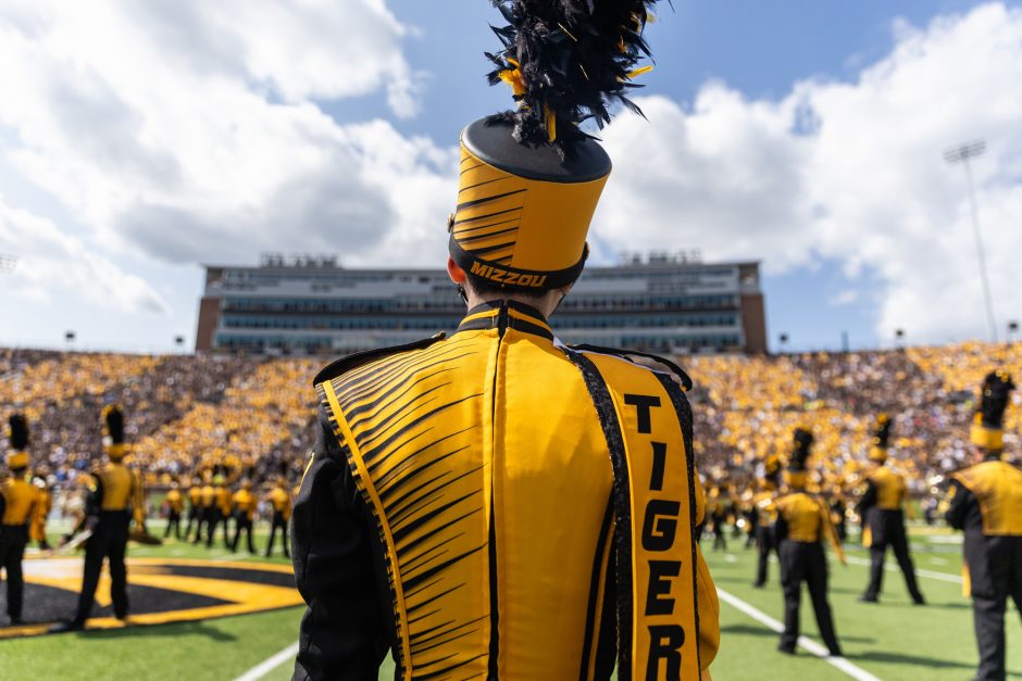 Back of Marching Mizzou member on the sideline