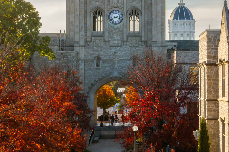 Fall trees with Memorial Union and the dome of Jesse Hall in the background