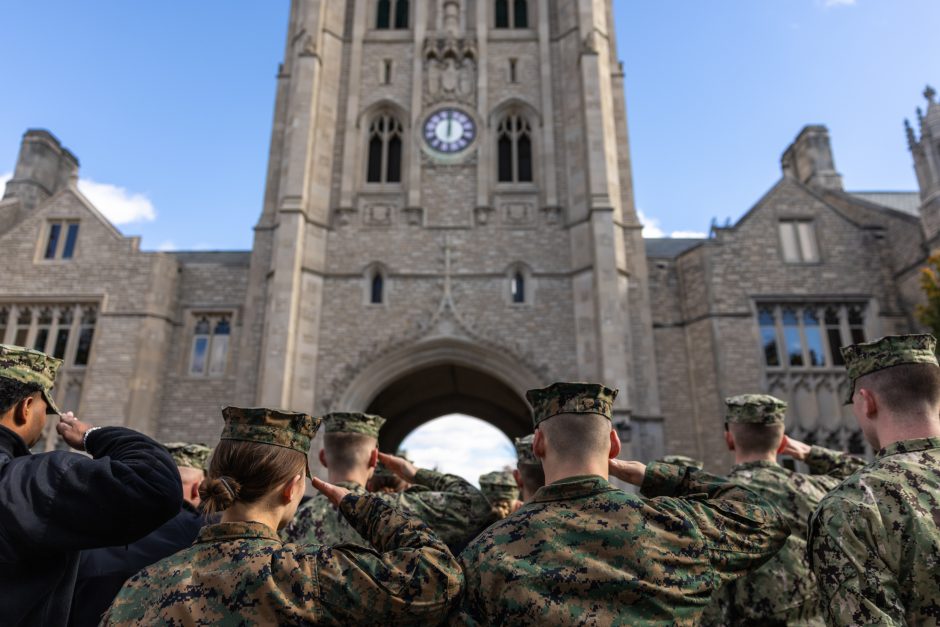 ROTC cadets saluting