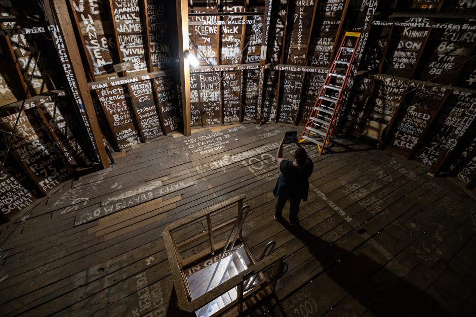 Person taking a photo of the inside of Jesse Hall dome