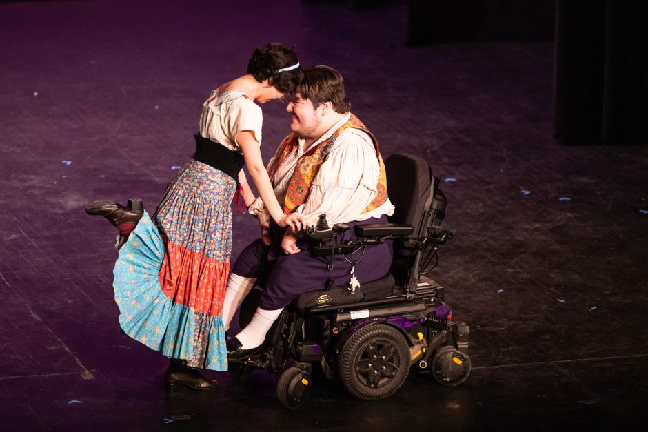 Two students dancing on stage