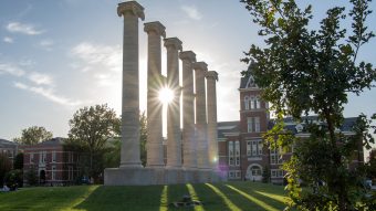 Sun peaks through the Columns