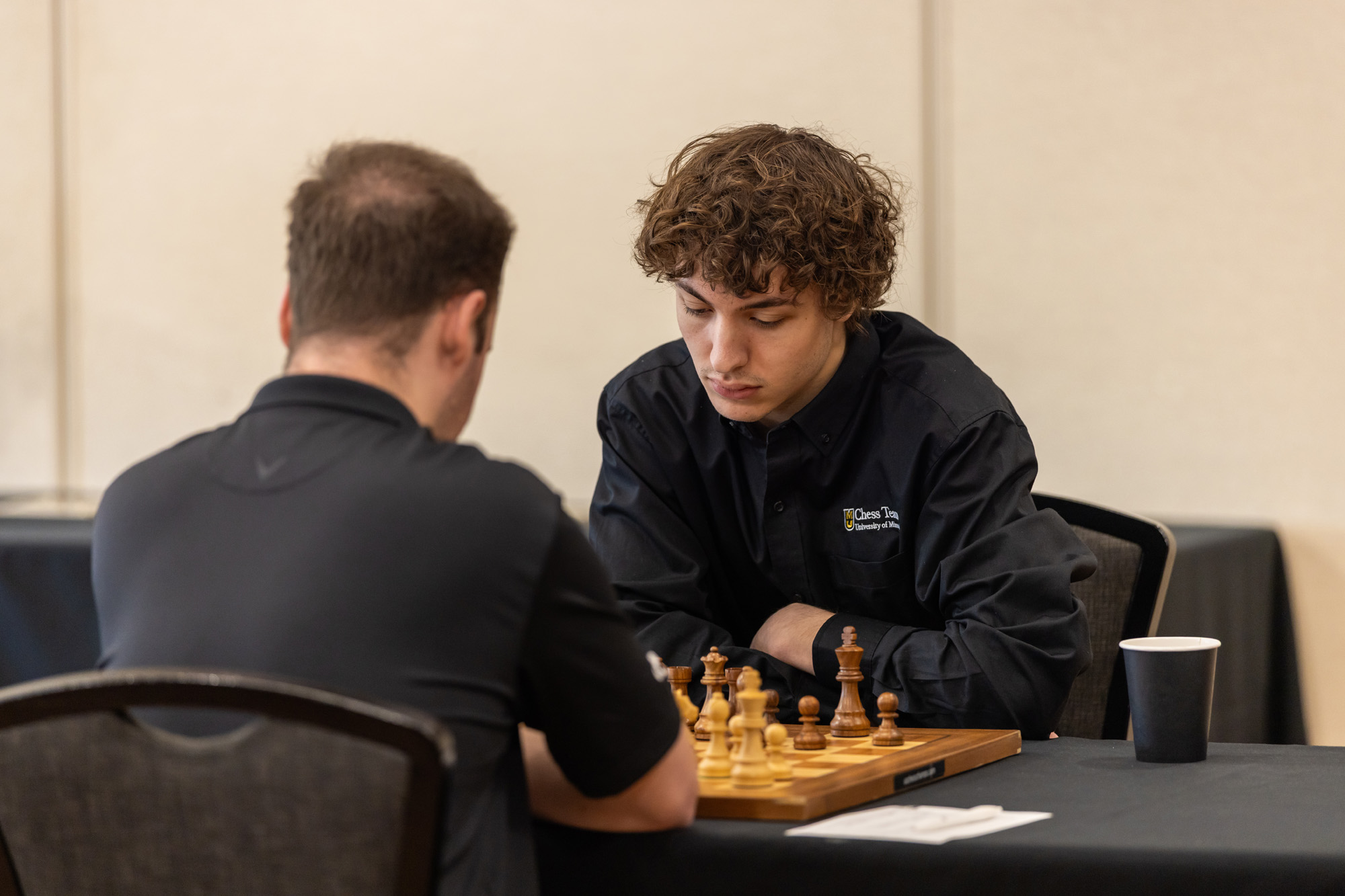Two people playing chess