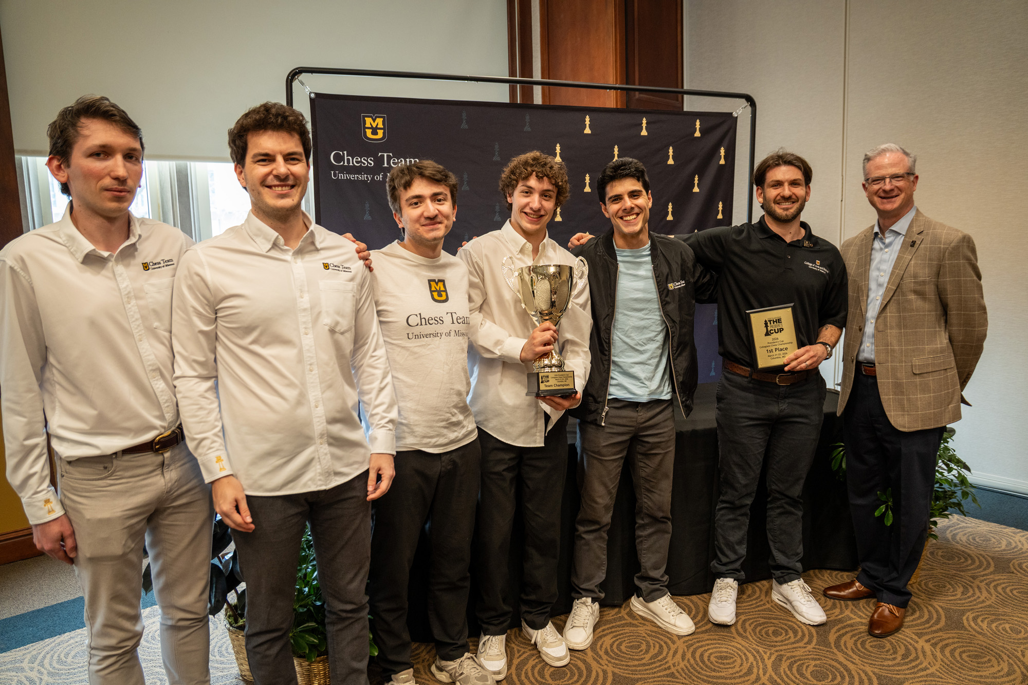 Chess team with trophy