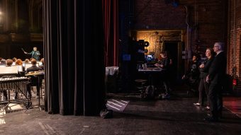 Two people backstage at the Missouri Theater