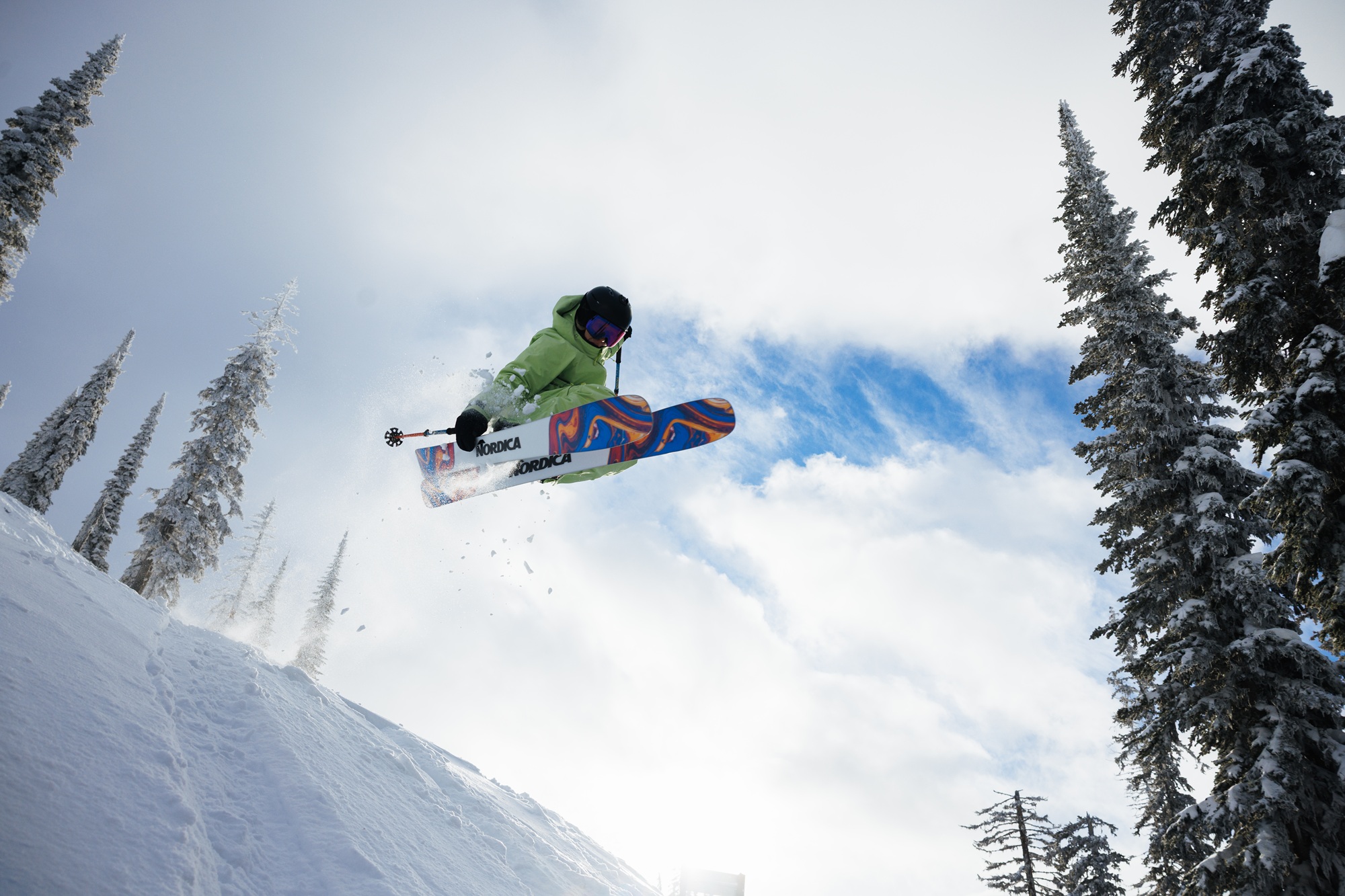 Erin Spong skiing down a snow-covered mountain