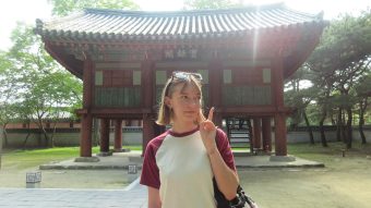 Rachel Mueller in front of structure