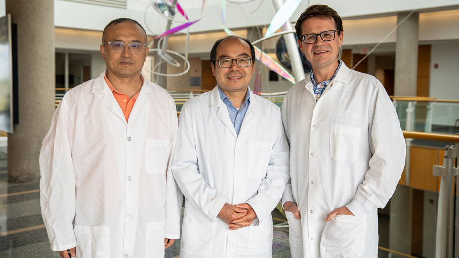 Researchers who study the flu posing.