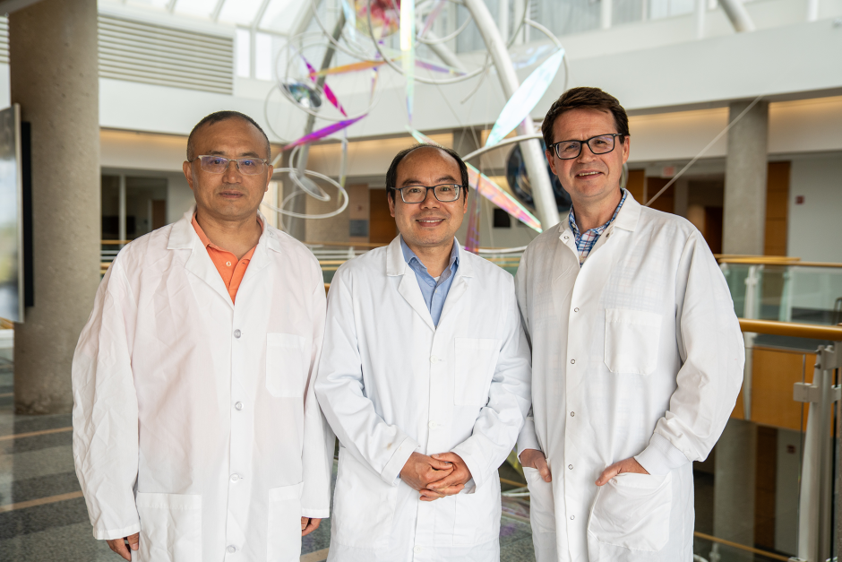 Researchers who study the flu posing.