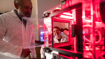 Researchers using the equipment in the Advanced Light Microscopy Core.
