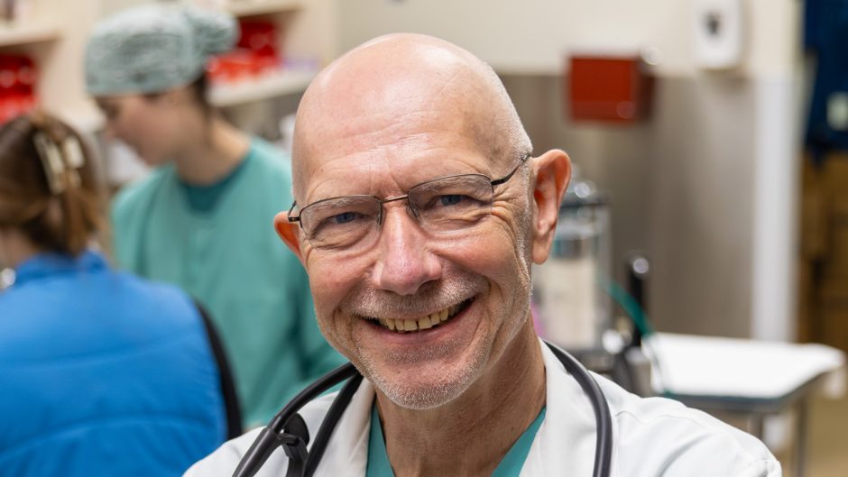 John Dodam in lab coat
