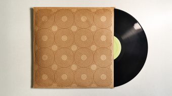 record spilling out of record sleeve