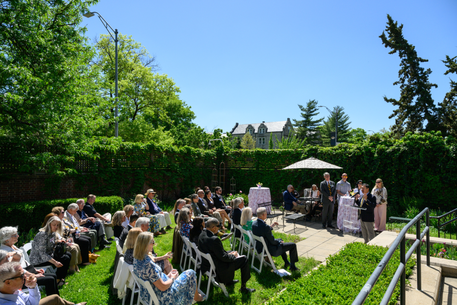 People seated at outdoor event
