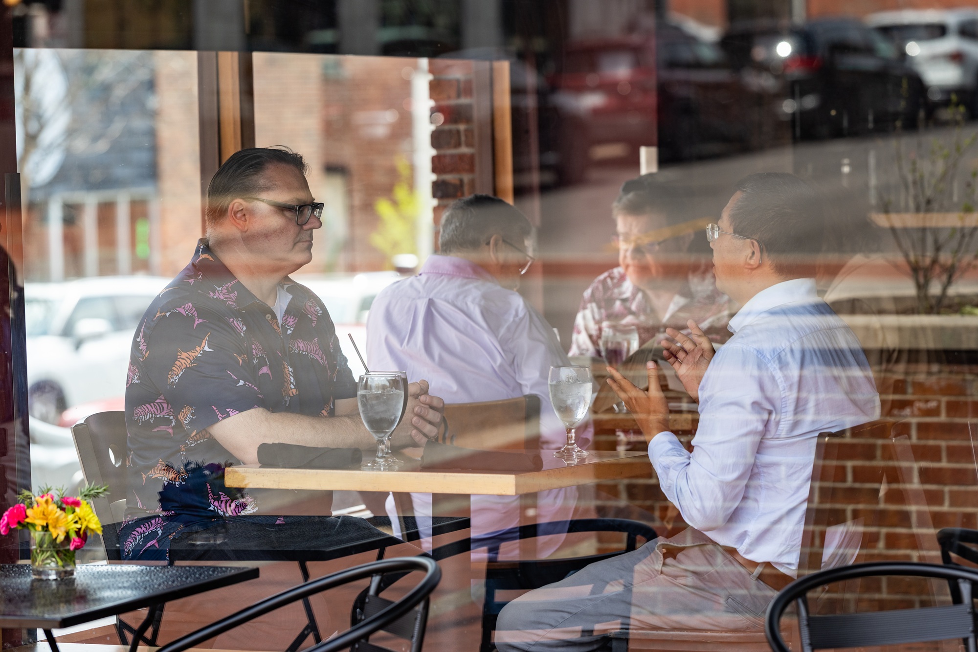 two researchers having lunch at a downtown Columbia restaurant