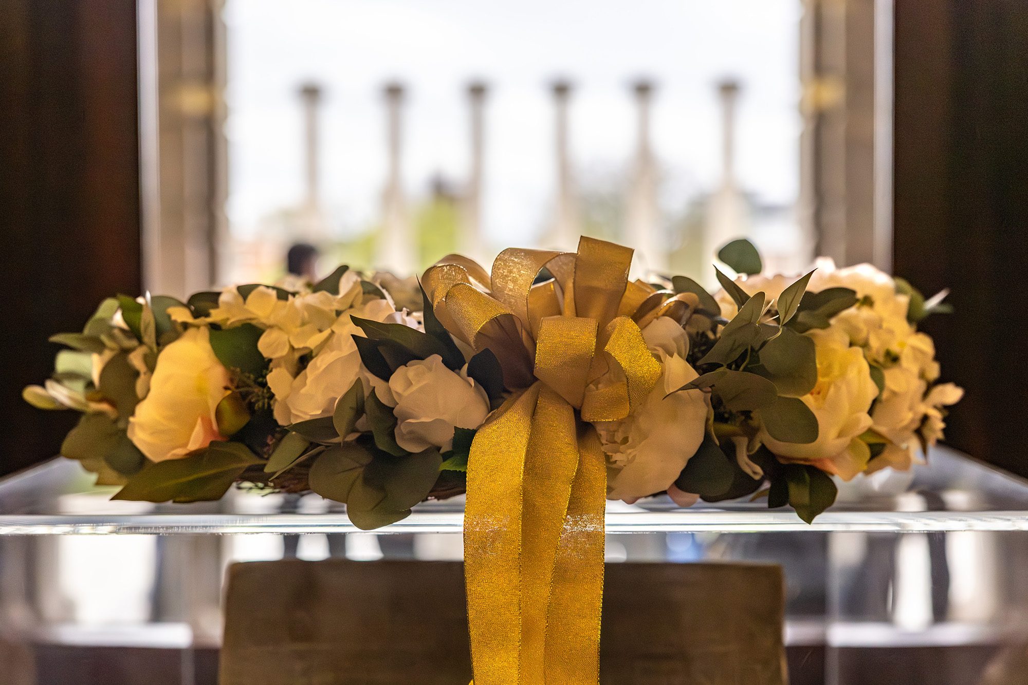 20260410_OP_MU-Remembers-028 Wreath of yellow and white flowers