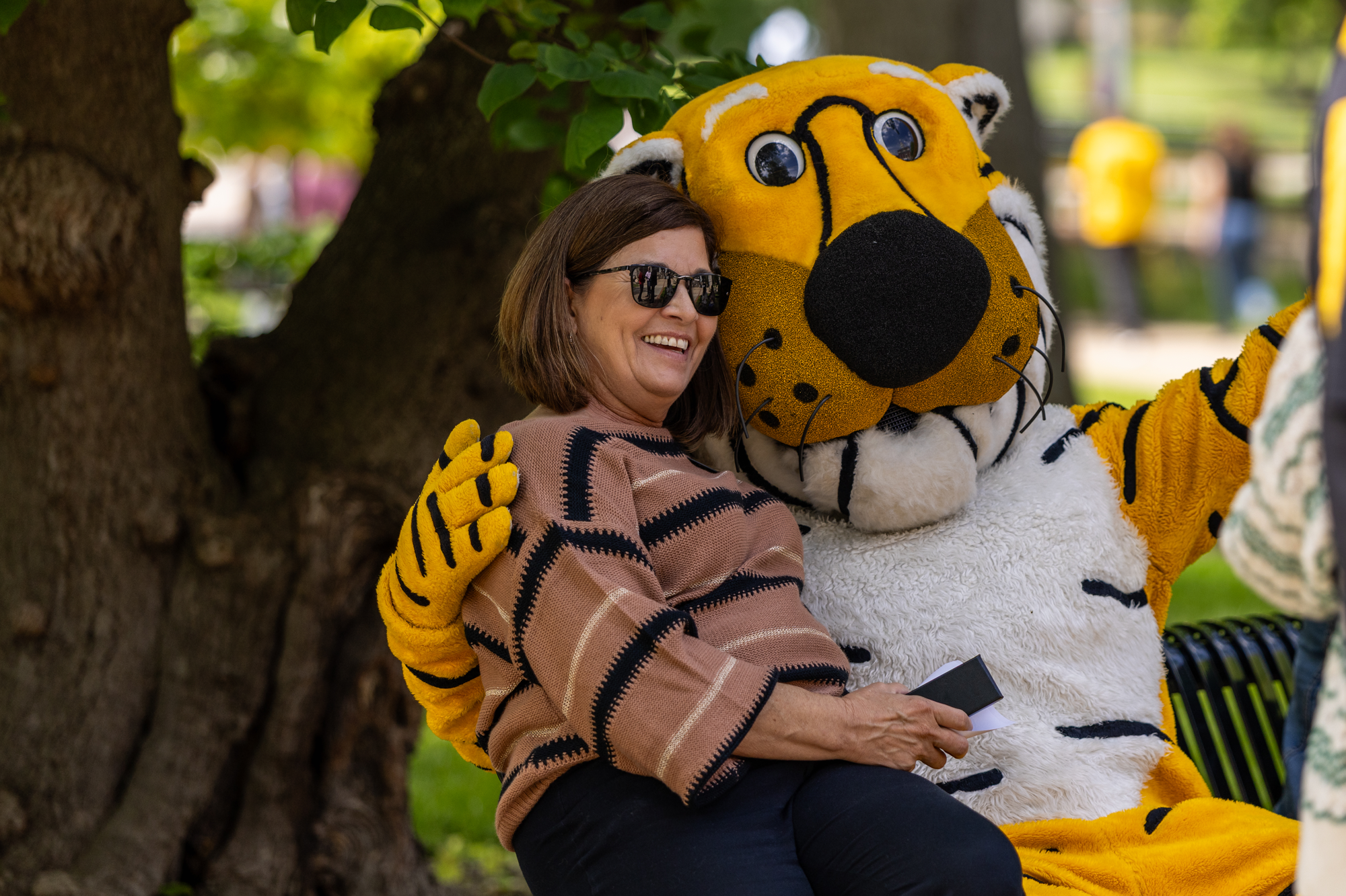Faculty member poses with Truman