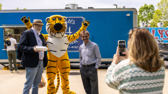Faculty members with Truman the Tiger