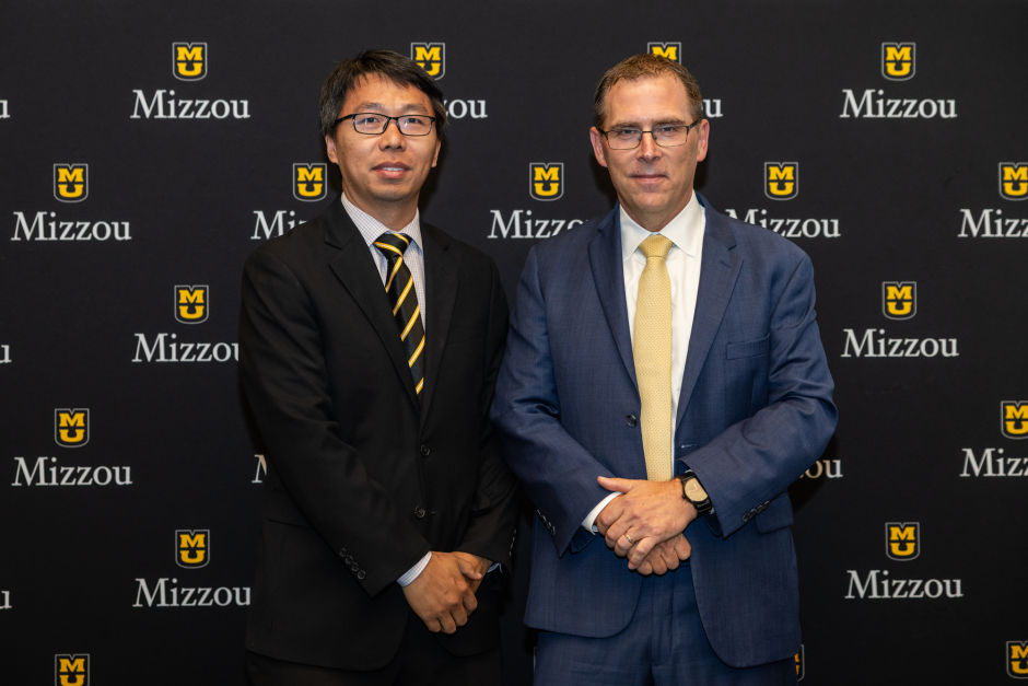 Pang Tian with provost