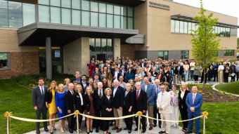 People gathered at ribbon cutting