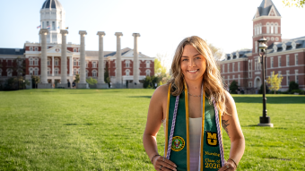 Schuyler Podolski posing on the quad.