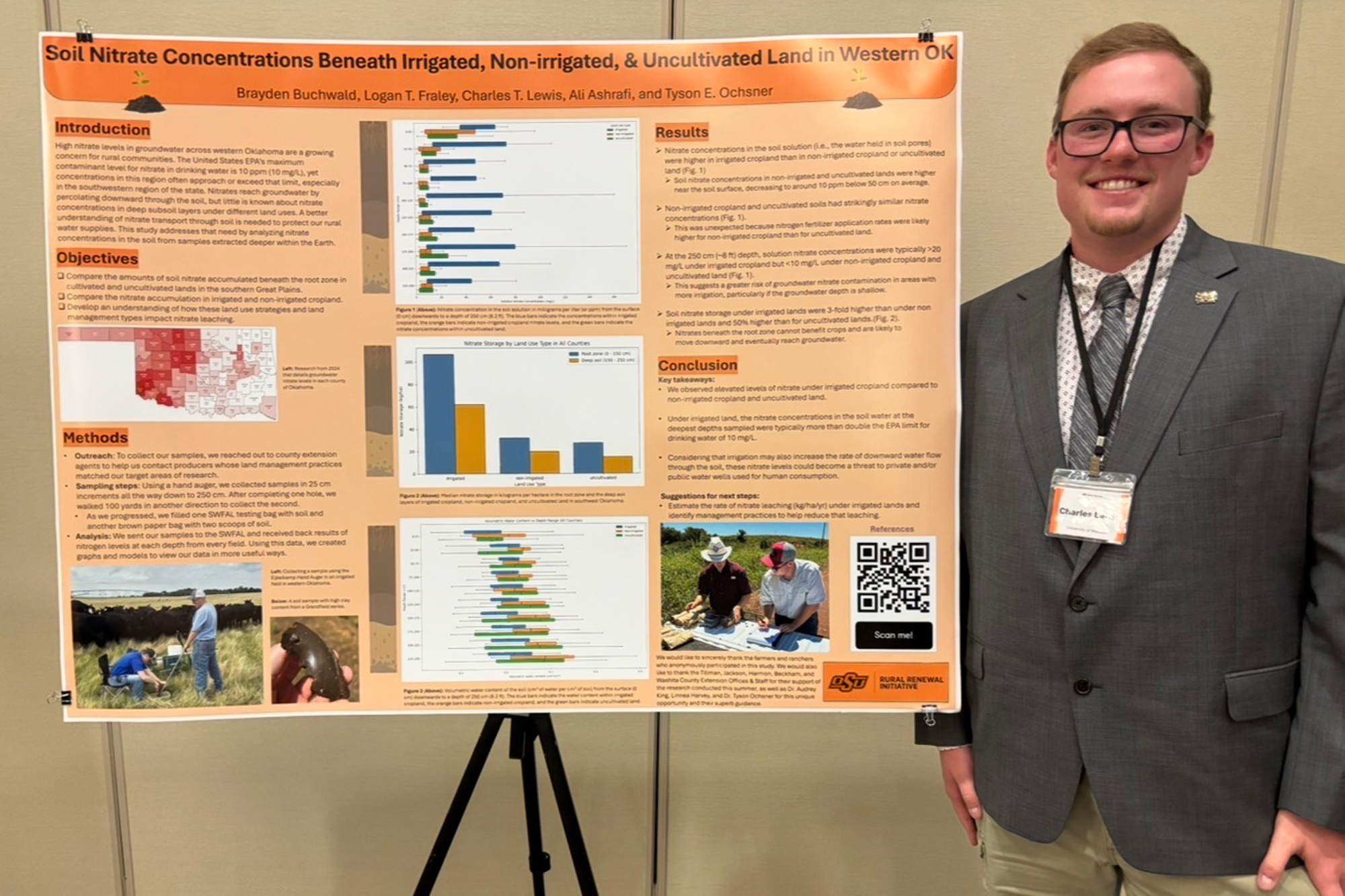 Charlie Lewis with research poster