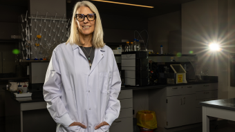Carolyn Anderson posing in a lab.