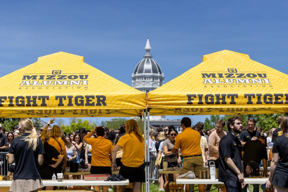 Jesse Hall dome in the background behind Mizzou Alumni Association tents