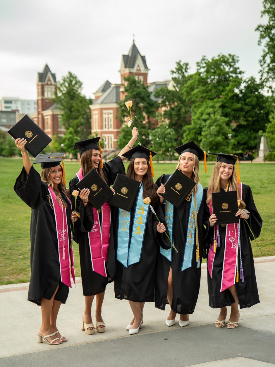 Nursing school graduates celebrate outside