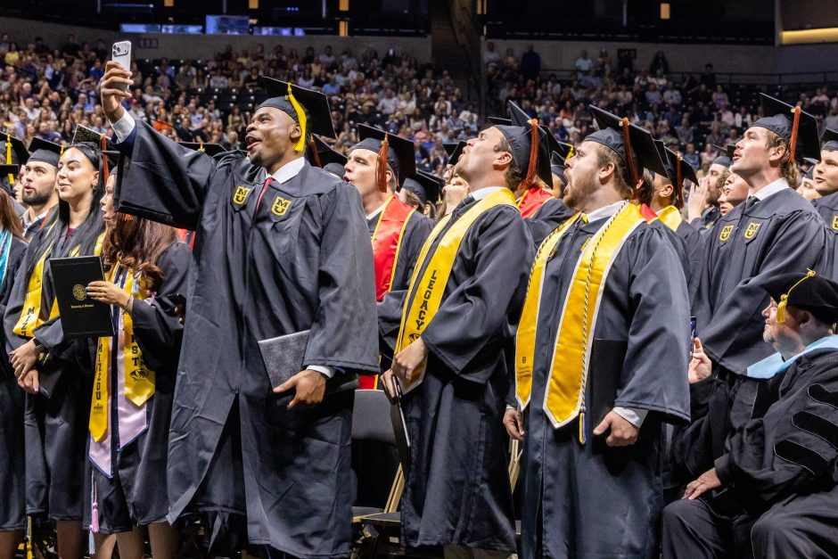 Group of graduates celebrating for a selfie