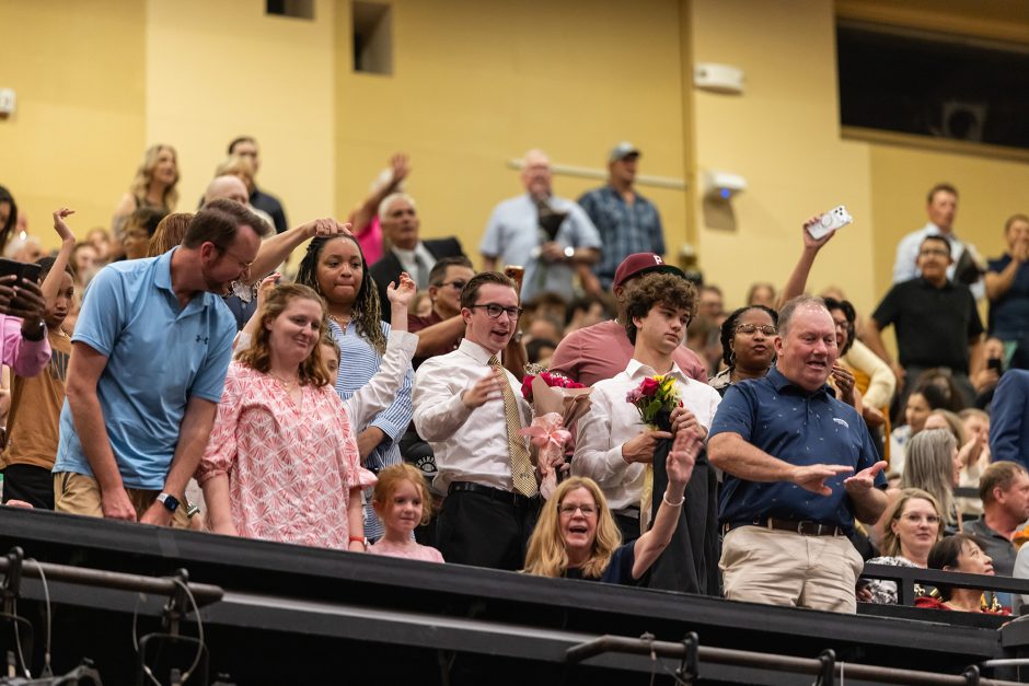 Crowd at ceremony cheering