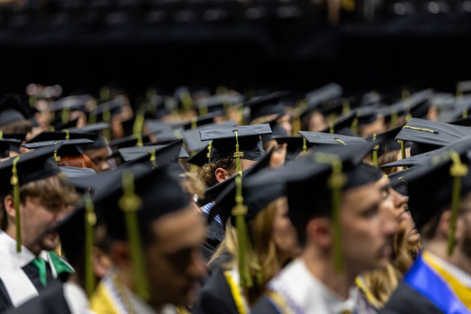 Numerous undergraduate graduation caps