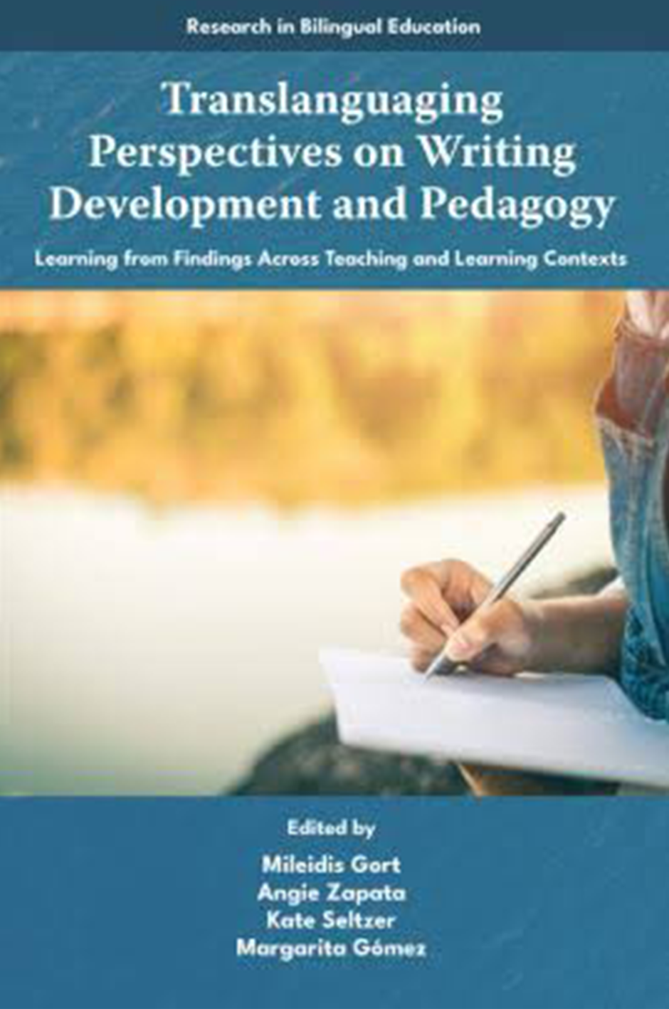 Book cover with hand and pen