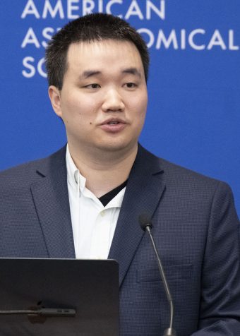 Bangzheng Sun at a podium