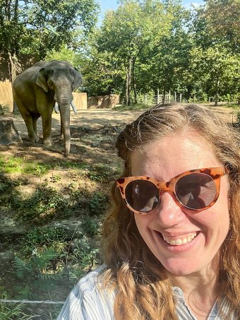 Kirby Meyer selfie with Raja the elephant in the background