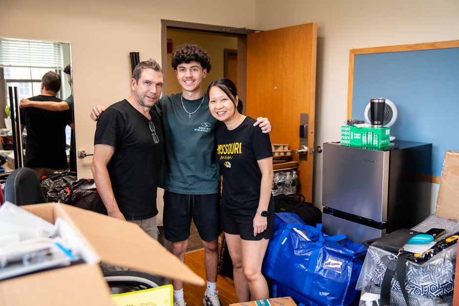 A family in a dorm room