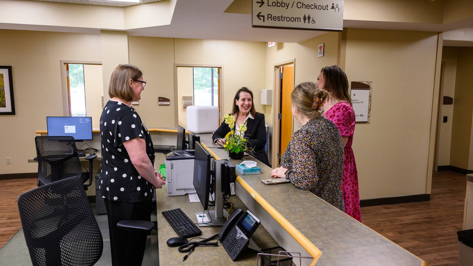 Leaders celebrating the opening of a new primary care clinic in Holts Summit.