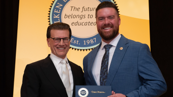 Two men with award