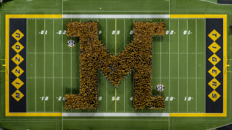 Students form M on field
