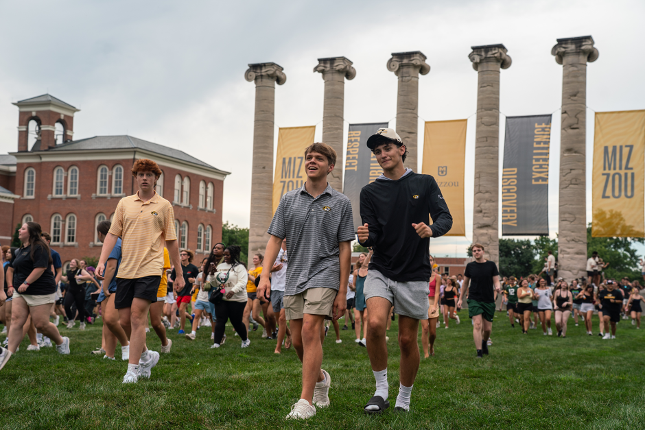 Students in front of Columns