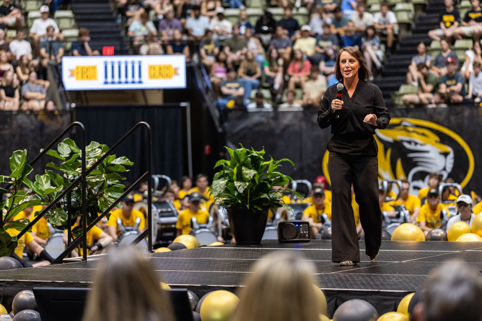 A speaker addresses the crowd