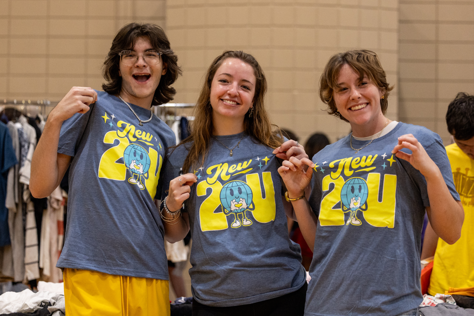 Three students in gray t-shirts