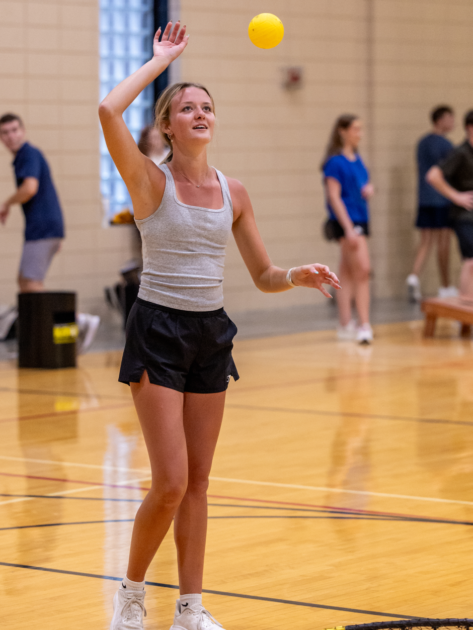 A student plays ball