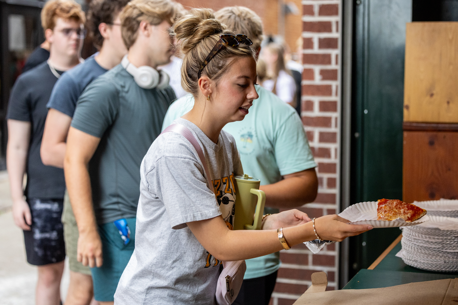 Students pick up pizza