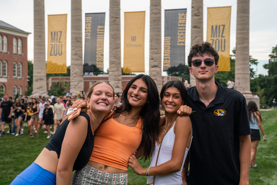 Students in front of Columns