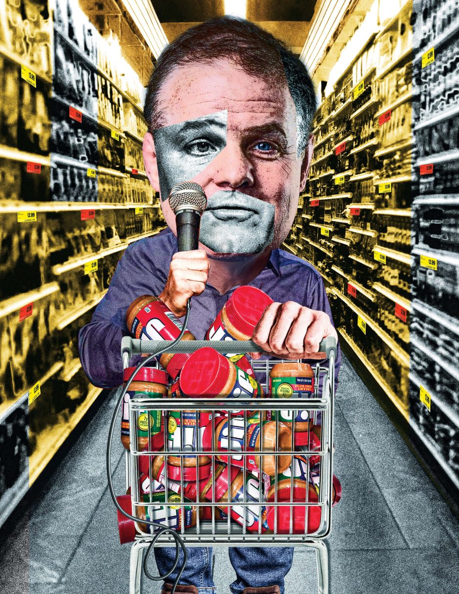 Greg Warren pushes a grocery cart full of peanut butter