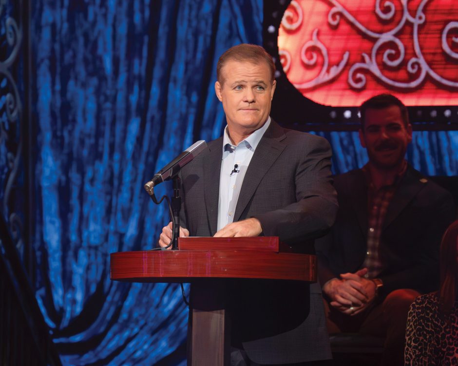 Warren performs on his game show