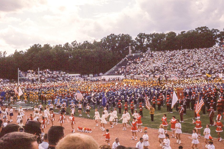 several high school bands perform on Faurot Field