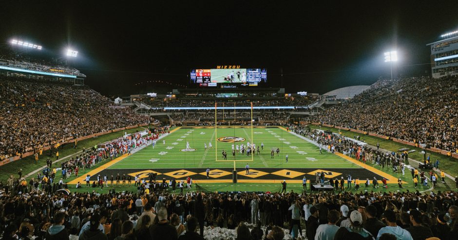 a packed Memorial Stadium at night