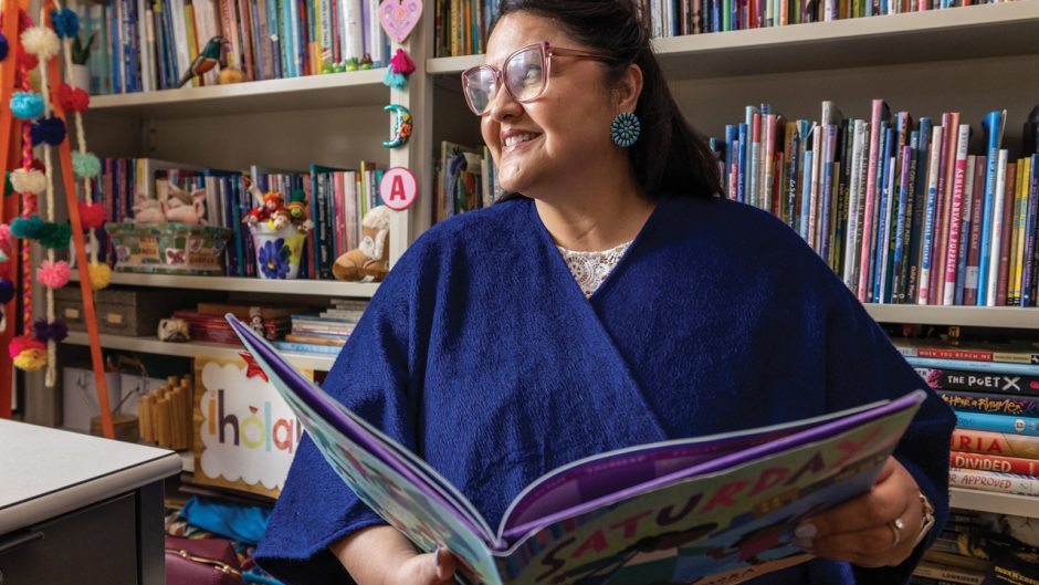 professor with children's book collection